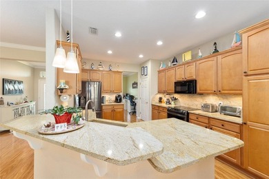 The perfect Hanover 3 Bedroom 2 bath Golf course home is just on Eagle Ridge At Spruce Creek Country Club in Florida - for sale on GolfHomes.com, golf home, golf lot