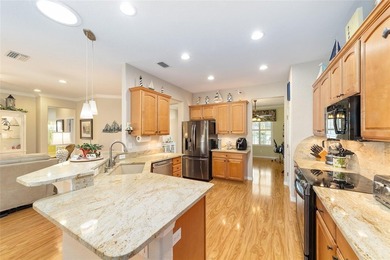 The perfect Hanover 3 Bedroom 2 bath Golf course home is just on Eagle Ridge At Spruce Creek Country Club in Florida - for sale on GolfHomes.com, golf home, golf lot