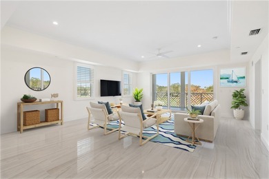 TASTEFULLY RENOVATED TOP FLOOR CORNER CONDO IN MAYFAIR HOUSE on Oak Harbor Country Club in Florida - for sale on GolfHomes.com, golf home, golf lot