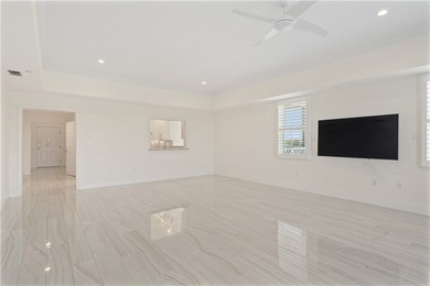 TASTEFULLY RENOVATED TOP FLOOR CORNER CONDO IN MAYFAIR HOUSE on Oak Harbor Country Club in Florida - for sale on GolfHomes.com, golf home, golf lot