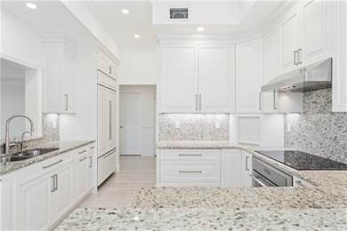 TASTEFULLY RENOVATED TOP FLOOR CORNER CONDO IN MAYFAIR HOUSE on Oak Harbor Country Club in Florida - for sale on GolfHomes.com, golf home, golf lot