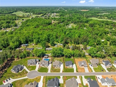 Welcome! Where comfort, charm, and thoughtful design come on Meadowlands Golf Club in North Carolina - for sale on GolfHomes.com, golf home, golf lot