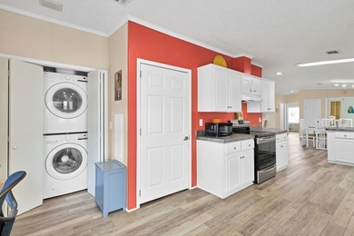 Beautifully maintained 2005 furnished home on a spacious lot. 1 on Barefoot Bay Golf Course in Florida - for sale on GolfHomes.com, golf home, golf lot