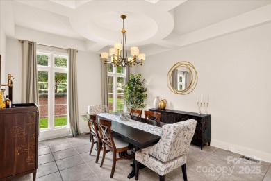Mediterranean elegance meets luxury living in this stately on TPC at Piper Glen in North Carolina - for sale on GolfHomes.com, golf home, golf lot