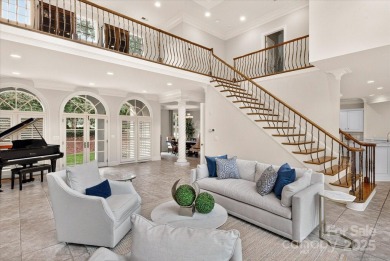 Mediterranean elegance meets luxury living in this stately on TPC at Piper Glen in North Carolina - for sale on GolfHomes.com, golf home, golf lot