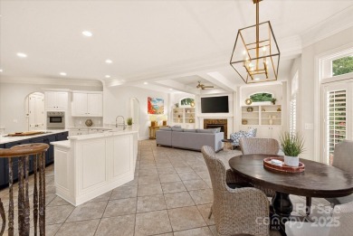 Mediterranean elegance meets luxury living in this stately on TPC at Piper Glen in North Carolina - for sale on GolfHomes.com, golf home, golf lot