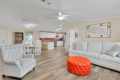 Beautifully maintained 2005 furnished home on a spacious lot. 1 on Barefoot Bay Golf Course in Florida - for sale on GolfHomes.com, golf home, golf lot