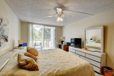 Welcome to this 2 bedroom/2 bathroom apartment in the Gardens of on Boca Grove Golf and Tennis in Florida - for sale on GolfHomes.com, golf home, golf lot