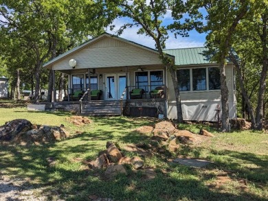 Your lovely lakefront home is just an easy hour drive outside on Twisted Oaks Golf Club in Texas - for sale on GolfHomes.com, golf home, golf lot