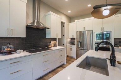 Recently built in 2023, this custom ranch home offers 5 bedrooms on Dakota Dunes Country Club in South Dakota - for sale on GolfHomes.com, golf home, golf lot