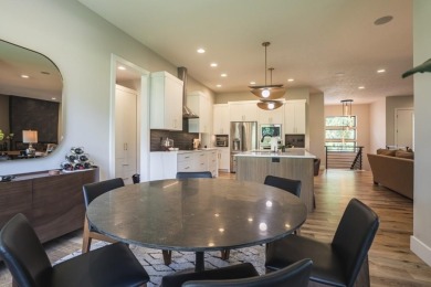 Recently built in 2023, this custom ranch home offers 5 bedrooms on Dakota Dunes Country Club in South Dakota - for sale on GolfHomes.com, golf home, golf lot
