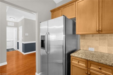 Step into the luxury this extremely well-kept townhouse has to on Meadowlands Golf Club in North Carolina - for sale on GolfHomes.com, golf home, golf lot