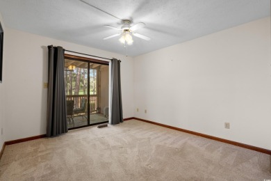 Discover your perfect getaway in this delightful first-floor on Myrtlewood Golf Course and Club  in South Carolina - for sale on GolfHomes.com, golf home, golf lot