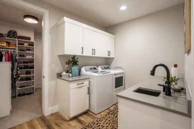 Recently built in 2023, this custom ranch home offers 5 bedrooms on Dakota Dunes Country Club in South Dakota - for sale on GolfHomes.com, golf home, golf lot