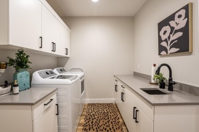 Recently built in 2023, this custom ranch home offers 5 bedrooms on Dakota Dunes Country Club in South Dakota - for sale on GolfHomes.com, golf home, golf lot