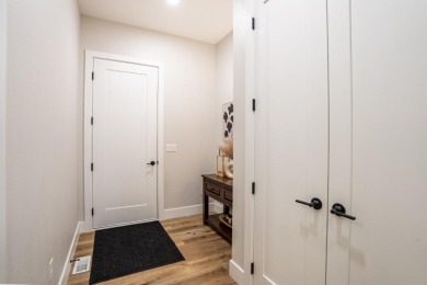 Recently built in 2023, this custom ranch home offers 5 bedrooms on Dakota Dunes Country Club in South Dakota - for sale on GolfHomes.com, golf home, golf lot
