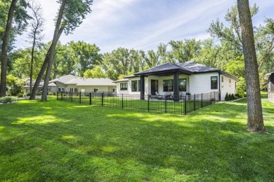 Recently built in 2023, this custom ranch home offers 5 bedrooms on Dakota Dunes Country Club in South Dakota - for sale on GolfHomes.com, golf home, golf lot