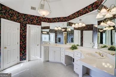 Nestled in the heart of the exclusive, gated community of Laurel on Laurel Springs Golf Club in Georgia - for sale on GolfHomes.com, golf home, golf lot