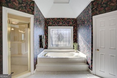 Nestled in the heart of the exclusive, gated community of Laurel on Laurel Springs Golf Club in Georgia - for sale on GolfHomes.com, golf home, golf lot