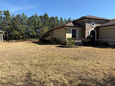 Stunning Castle Rock model with a Bonus den and sunroom and an on Stone Creek Golf Club in Florida - for sale on GolfHomes.com, golf home, golf lot