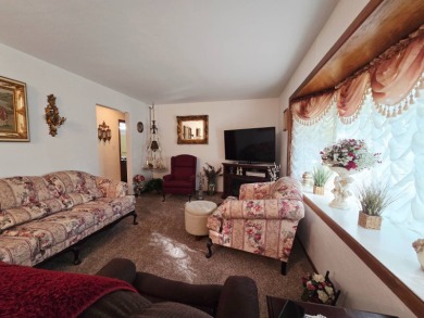 Discover this inviting 3-bedroom ranch near Wakonda Golf Club in on Wakonda Club in Iowa - for sale on GolfHomes.com, golf home, golf lot