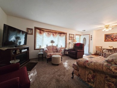 Discover this inviting 3-bedroom ranch near Wakonda Golf Club in on Wakonda Club in Iowa - for sale on GolfHomes.com, golf home, golf lot