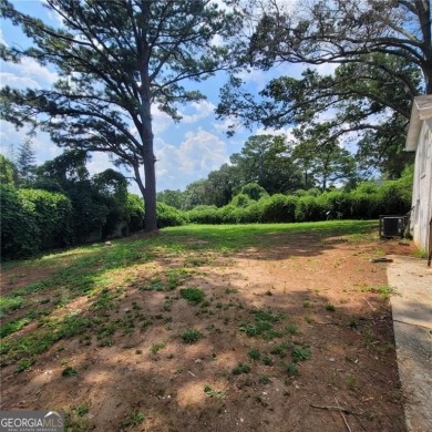 Discover 1825 Willis Mill Rd SW**, a beautifully renovated brick on John A. White Golf Course in Georgia - for sale on GolfHomes.com, golf home, golf lot