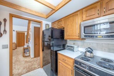 Don't miss this charming 3-Bedroom, 2-Bathroom Home with on Canadian Lakes Country Club-The Royal Course in Michigan - for sale on GolfHomes.com, golf home, golf lot