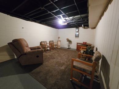 Discover this inviting 3-bedroom ranch near Wakonda Golf Club in on Wakonda Club in Iowa - for sale on GolfHomes.com, golf home, golf lot