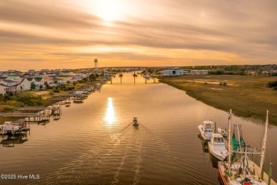 WATERFRONT COMMUNITY with private MARINA! Just 5 miles away from on Lockwood Folly Country Club in North Carolina - for sale on GolfHomes.com, golf home, golf lot