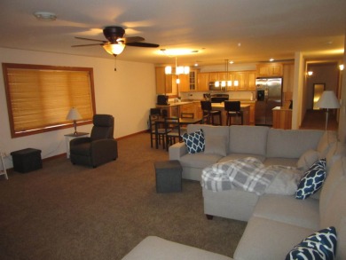 Discover the epitome of condo living in this 4-bed, 2-bath condo on Northern Bay Golf Resort and Marina in Wisconsin - for sale on GolfHomes.com, golf home, golf lot