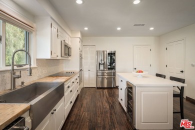 Welcome to your dream retreat in the picturesque Woodland Hills on Woodland Hills Country Club in California - for sale on GolfHomes.com, golf home, golf lot