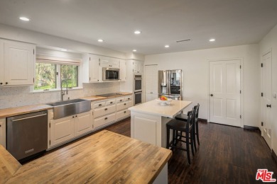 Welcome to your dream retreat in the picturesque Woodland Hills on Woodland Hills Country Club in California - for sale on GolfHomes.com, golf home, golf lot