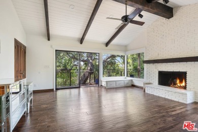 Welcome to your dream retreat in the picturesque Woodland Hills on Woodland Hills Country Club in California - for sale on GolfHomes.com, golf home, golf lot