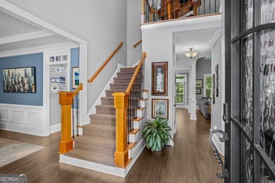 Discover a rare opportunity to own a beautifully updated home in on The Golf Club of Georgia in Georgia - for sale on GolfHomes.com, golf home, golf lot