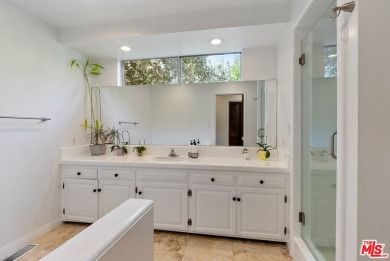 Welcome to your dream retreat in the picturesque Woodland Hills on Woodland Hills Country Club in California - for sale on GolfHomes.com, golf home, golf lot
