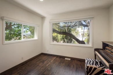 Welcome to your dream retreat in the picturesque Woodland Hills on Woodland Hills Country Club in California - for sale on GolfHomes.com, golf home, golf lot