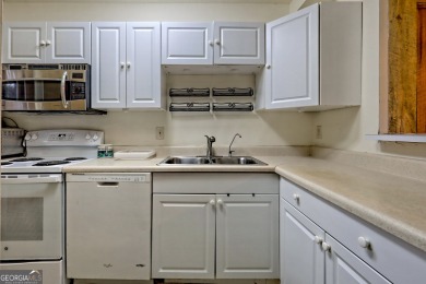 Newly carpeted,  open floor plan, large dining & living room on Kingwood Golf Club and Resort in Georgia - for sale on GolfHomes.com, golf home, golf lot