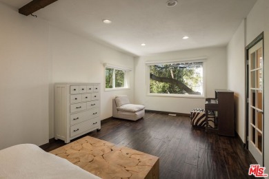 Welcome to your dream retreat in the picturesque Woodland Hills on Woodland Hills Country Club in California - for sale on GolfHomes.com, golf home, golf lot