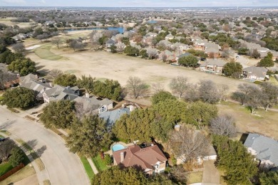 Step into this beautifully former model home and fully updated on Stonebridge Ranch Country Club in Texas - for sale on GolfHomes.com, golf home, golf lot