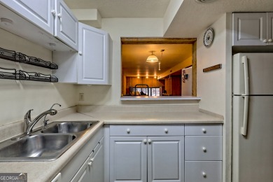 Newly carpeted,  open floor plan, large dining & living room on Kingwood Golf Club and Resort in Georgia - for sale on GolfHomes.com, golf home, golf lot
