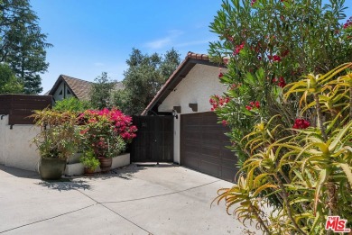 Welcome to your dream retreat in the picturesque Woodland Hills on Woodland Hills Country Club in California - for sale on GolfHomes.com, golf home, golf lot