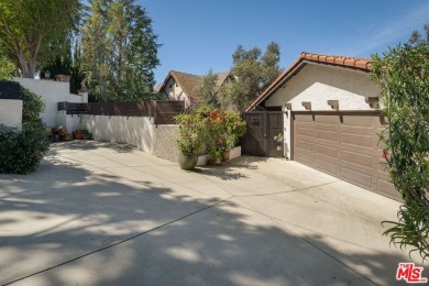 Welcome to your dream retreat in the picturesque Woodland Hills on Woodland Hills Country Club in California - for sale on GolfHomes.com, golf home, golf lot