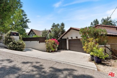 Welcome to your dream retreat in the picturesque Woodland Hills on Woodland Hills Country Club in California - for sale on GolfHomes.com, golf home, golf lot