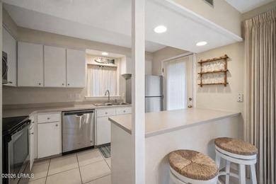 This beautifully positioned CORNER UNIT offers a rare and highly on Palmetto Dunes Golf Course and Resort in South Carolina - for sale on GolfHomes.com, golf home, golf lot