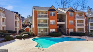 Perched on the top floor and overlooking the sparkling community on North Fulton Golf Course in Georgia - for sale on GolfHomes.com, golf home, golf lot