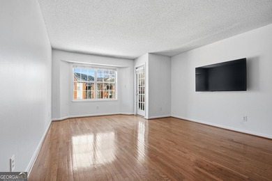 Perched on the top floor and overlooking the sparkling community on North Fulton Golf Course in Georgia - for sale on GolfHomes.com, golf home, golf lot