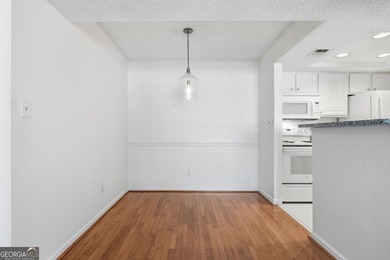 Perched on the top floor and overlooking the sparkling community on North Fulton Golf Course in Georgia - for sale on GolfHomes.com, golf home, golf lot