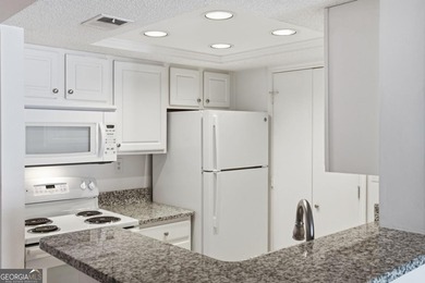 Perched on the top floor and overlooking the sparkling community on North Fulton Golf Course in Georgia - for sale on GolfHomes.com, golf home, golf lot