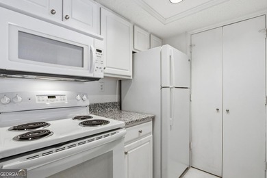 Perched on the top floor and overlooking the sparkling community on North Fulton Golf Course in Georgia - for sale on GolfHomes.com, golf home, golf lot